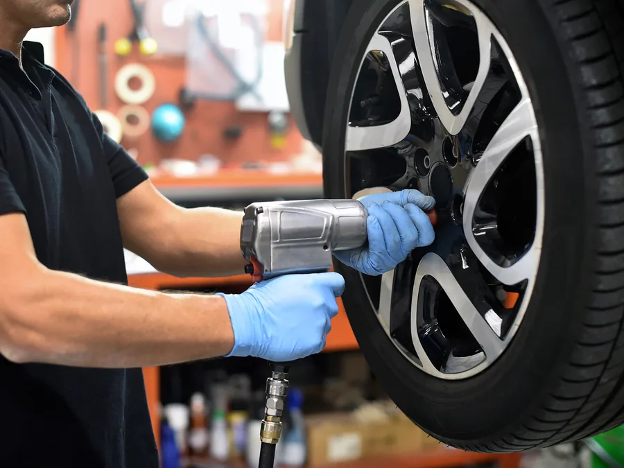 A wheel coming off with the vehicle on a two-post lift