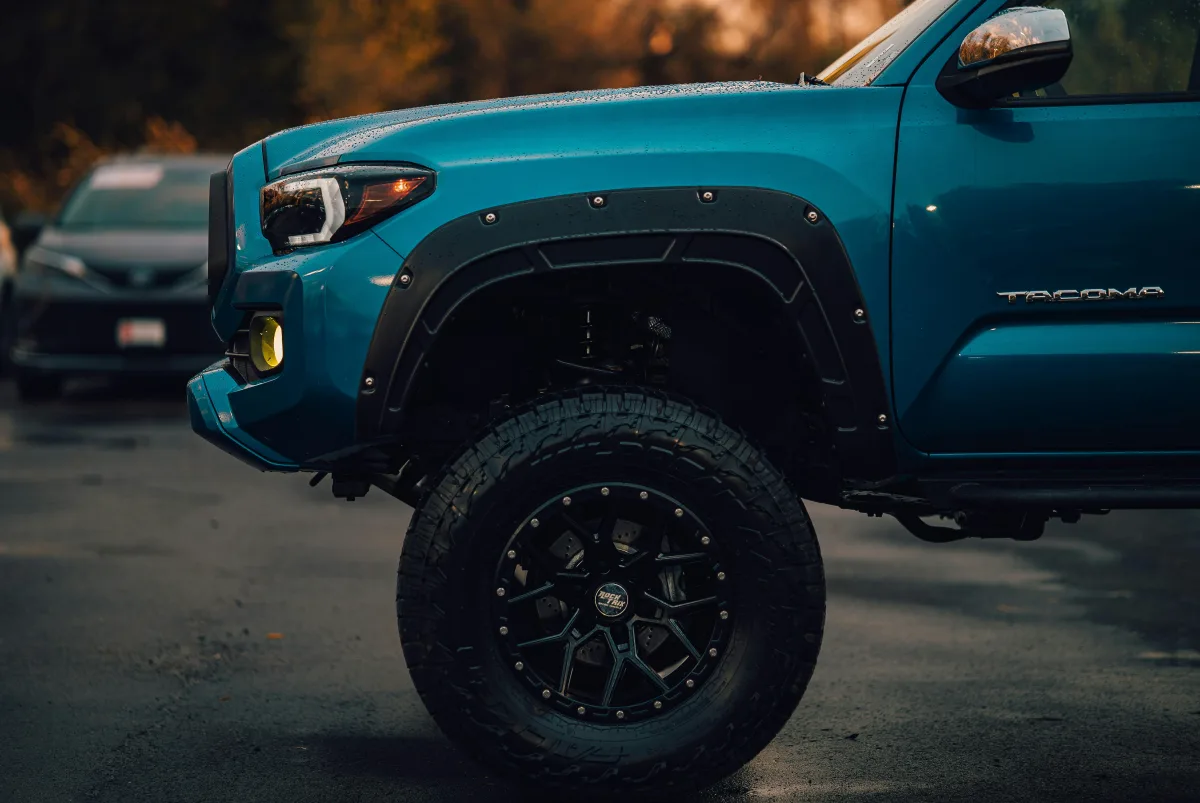 A lifted truck running an auxiliary lamp